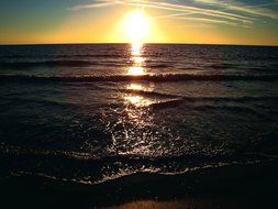 orange sunset over the dark ocean