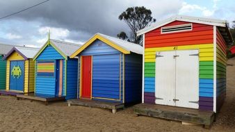 color huts on the beach