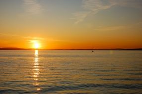 Panorama of the sunset on the lake