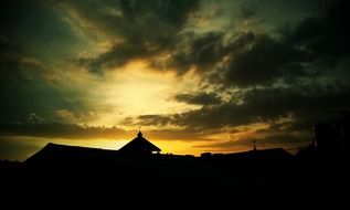 silhouette of a mosque at dusk