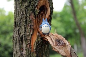 chinchilla toy on a tree