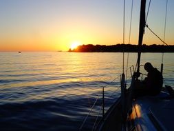 sailing boat in the sunset light
