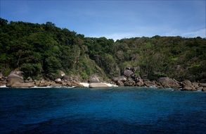 view from the water on the coast of the Similan Islands