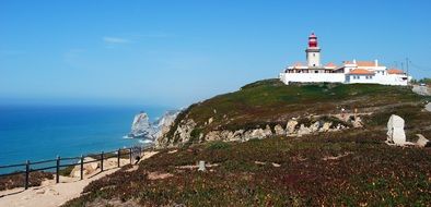 landscape of lighthouse on a hill in portugal
