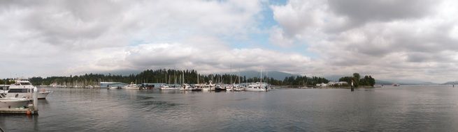 coastline panorama with boats on water, canada, Vancouver, stanley park