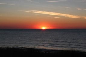 distant view of orange sunset over the Baltic Sea