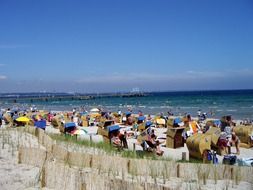 lot of people on a sunny beach