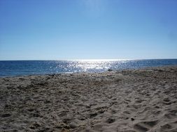sandy beach on a bright sunny day
