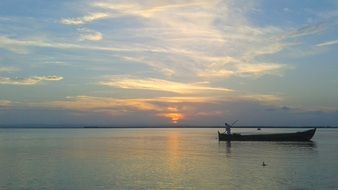 boat at sunset in spain