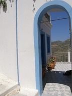 arched passage among traditional architecture in greece