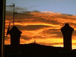 roof silhouette at sunset sky