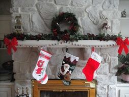 christmas red socks over the fireplace
