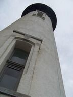 tall white lighthouse on the coast of Oregon