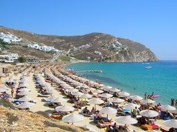 umbrellas on the beach on an island in greece