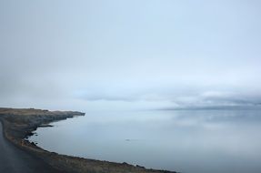 tranquil sea coast on rainy weather