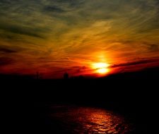 Golden sunset and shadows above the lake