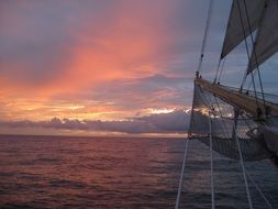 sunset sky against a sail