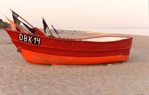Red boat send beach sea