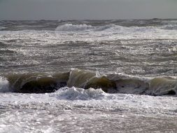 grey foamy waves of stormy north sea