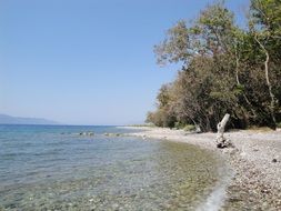 wild pebble beach in Greece