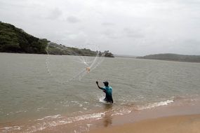 fishing on the river Terekhol, India