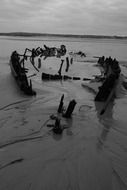 wrecked ship in sand on south foreshore