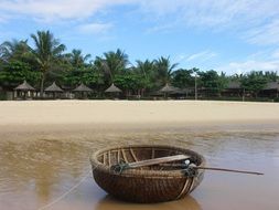 round boat on the beach
