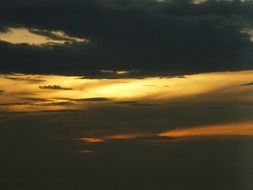 clouds in golden sunset sky