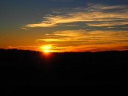 orange sunset over the forest