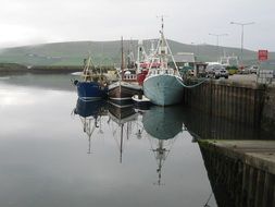 boats in port on a gray day, ireland, dingle