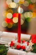 christmas decoration with red candle