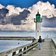 great clouds over lighthouse