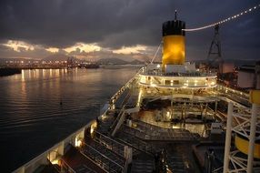 cruise ship in ocean in the evening