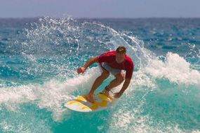 Skilled young surfer