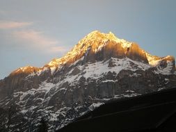 golden peaks of mountains at sunrise in Switzerland
