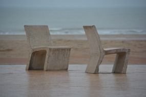 Stone chairs sea rest duo beach
