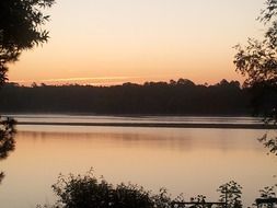 sunset over a quiet lake