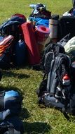 backpacks for traveling on green grass
