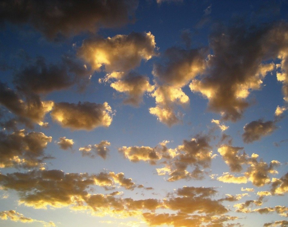 golden shiny clouds in the sky