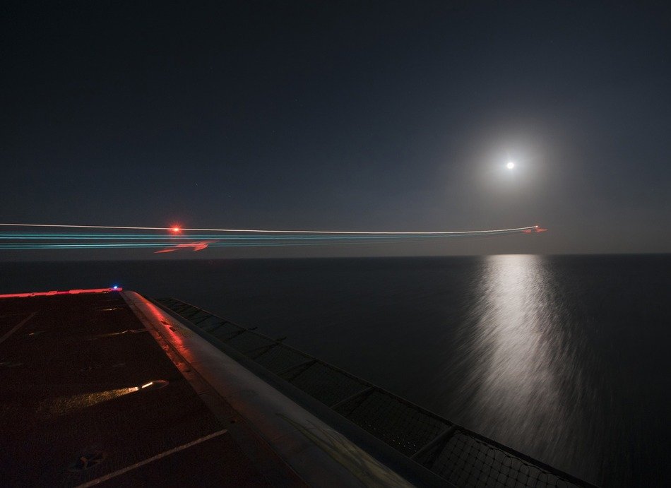 traces of a fighter in the night sky