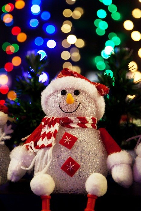 plush snowman with the colorful lights