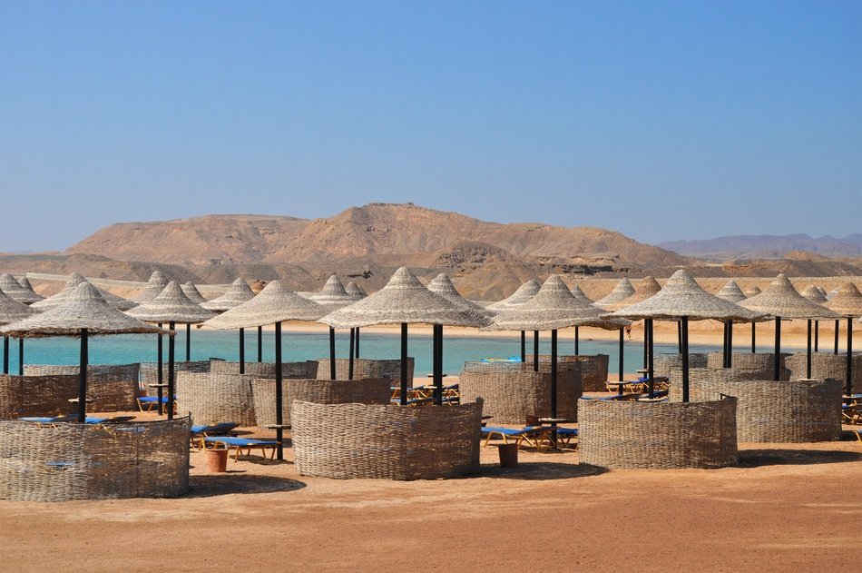 gazebos on the beach near the sea