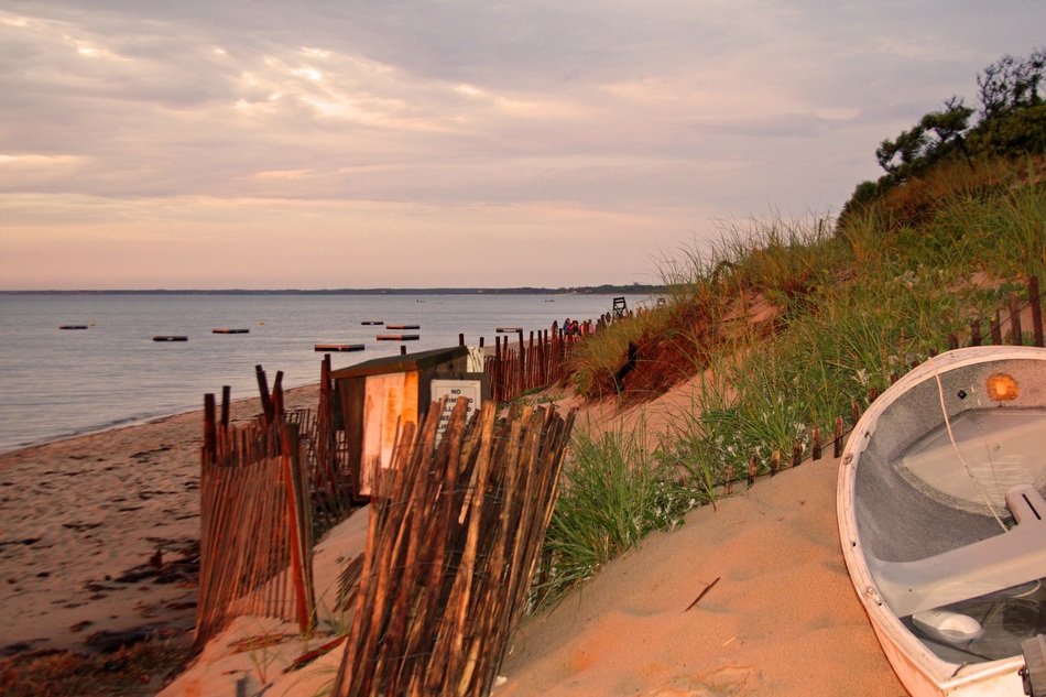 Boats on a sand sunset