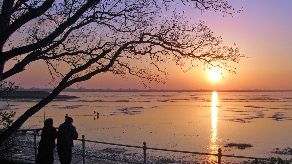 atmospheric sunset with people scene