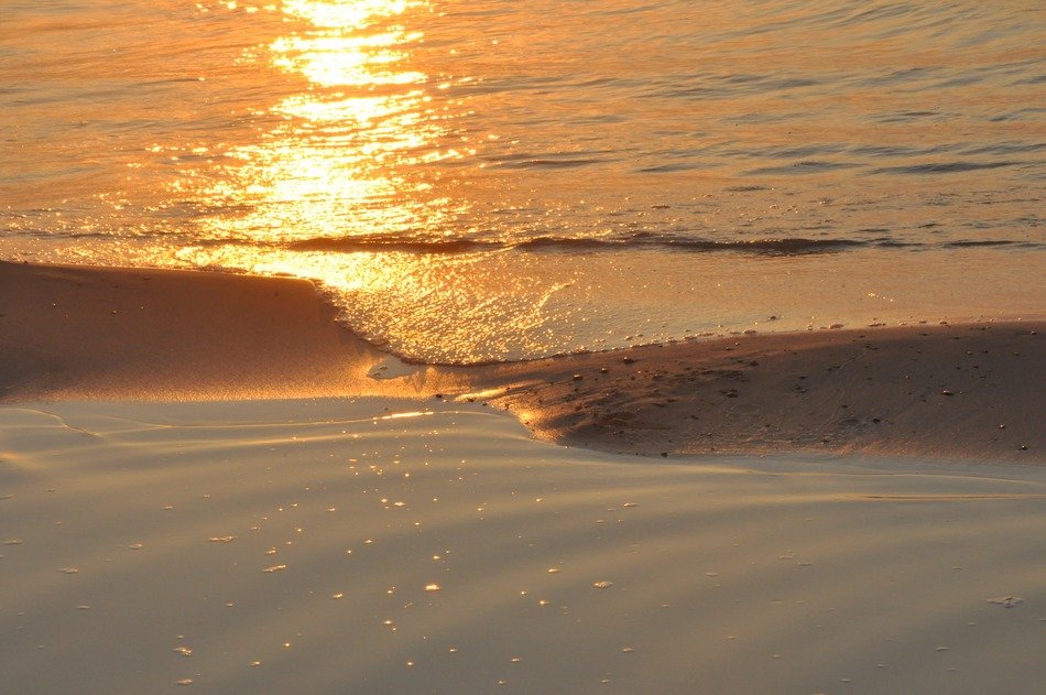 waves of the baltic sea in the bright rays of sunset