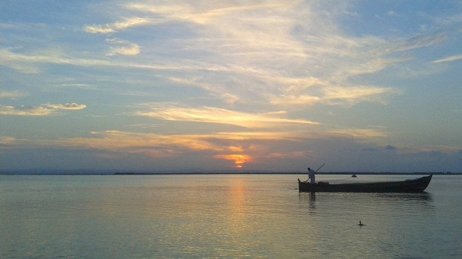 boat at sunset in spain