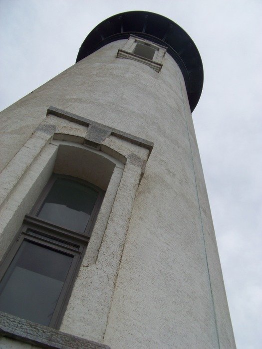tall white lighthouse on the coast of Oregon