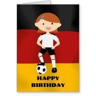 girl soccer player on the background of the German flag