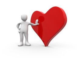 white man is holding a red heart