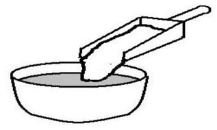 painted bowl and scoop with sugar